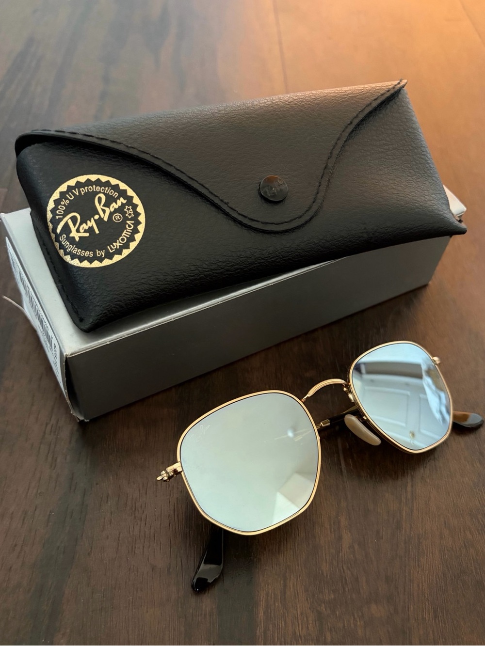 Ray-Ban Women’s Gold Frame Sunglasses with Light Blue Lenses